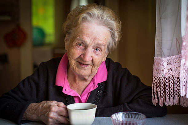 istock Portrait of elderly woman drinking tea. 499153382