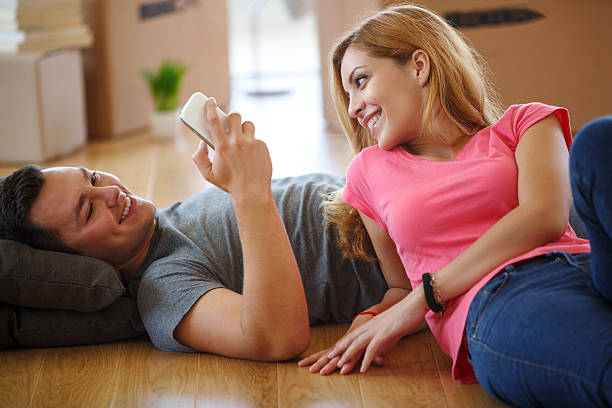 istock Young couple resting from moving into a new  home 499153816