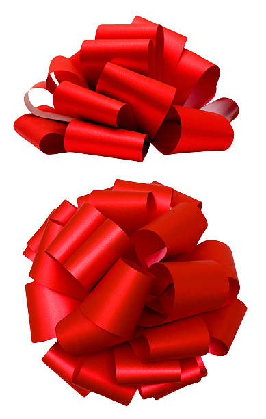Red lush bow isolated over white, clipping path Red lush bow isolated over white with clipping path; side and top view tied knot photos stock pictures, royalty-free photos & images