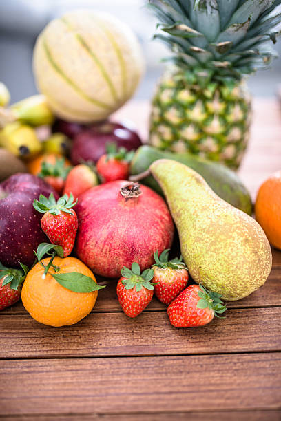 istock bunch of tropical fruit on the table 499155622