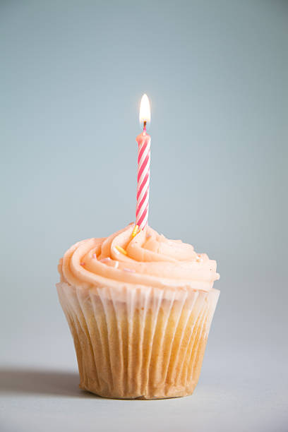 Cupcake with candle  cupcake candle stock pictures, royalty-free photos & images
