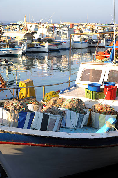 istock Fishing boat with net in Cyprus 499159994