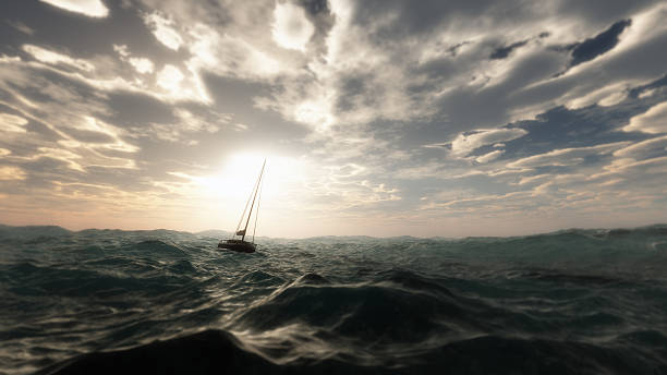 lost barca a vela nella tempesta selvaggia oceano.  cielo nuvoloso. - barca da diporto foto e immagini stock