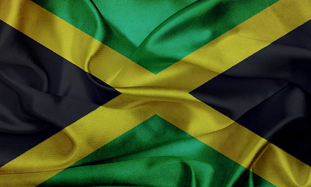 istock Jamaica grunge waving flag 499170901