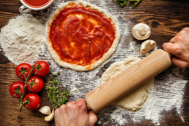 istock Fresh original Italian raw pizza preparation 499171140