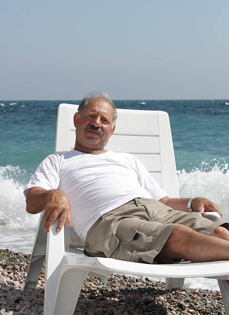 istock Senior man in the chaise lounge 499171479