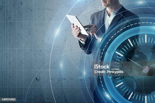 Businessman With Tablet Computer And Digital Interface Stock Photo - Download Image Now