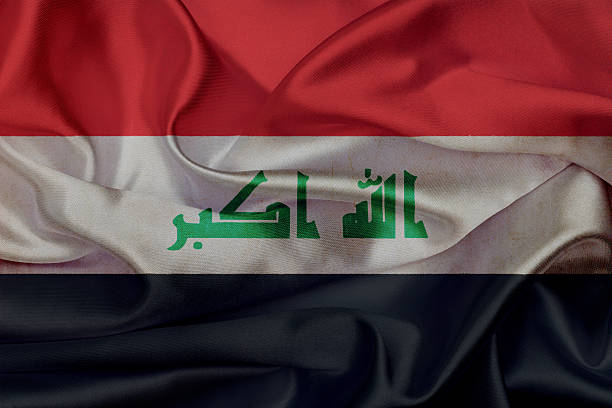 istock Iraq grunge waving flag 499176081
