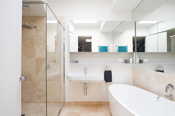 istock Crisp clean white and marble bathroom in luxury home 499176872
