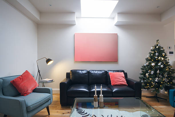 istock Three seater sofa in living room with christmas tree 499177678