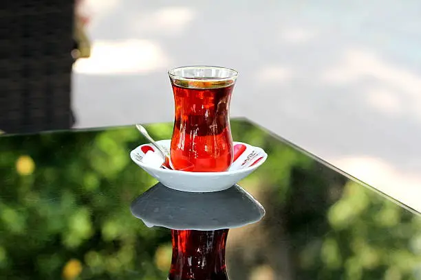 Turkish tea with traditional teaglass On a table