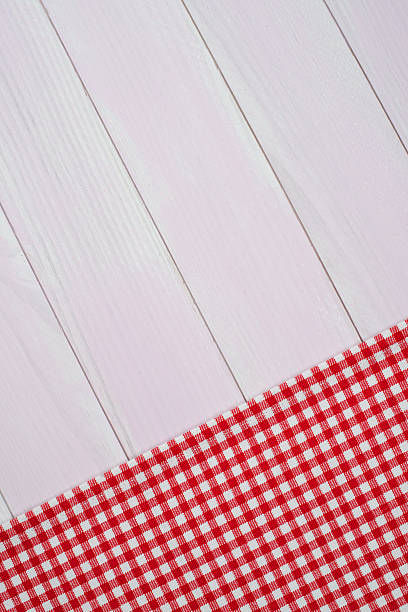 istock White and red towel over wooden table 499179866