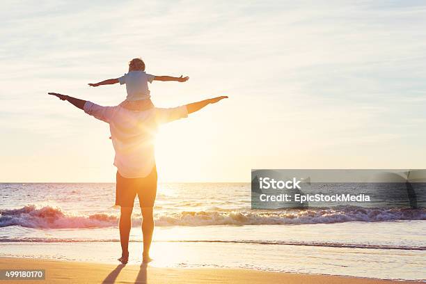 Father And Son Playing Together Stock Photo - Download Image Now - Carefree, 2015, Adult