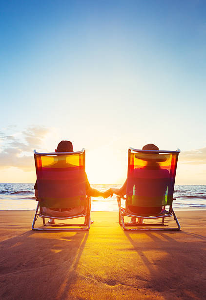istock Retirement Vacation Concept, Mature Coupe Watching the Sunset 499180738