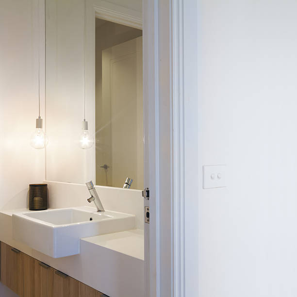 istock Close up Australian light switch on wall and pendant light 499181468