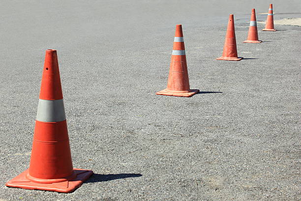 traffic cones background traffic cones background for use in industrial, car park, construction, no parking cone stock pictures, royalty-free photos & images