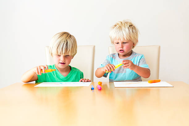 istock Little boys drawing pictures 499188855