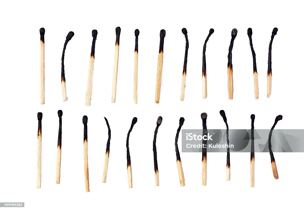 burnt match Burnt matches isolated on a white background. Wooden matches. Match - Lighting Equipment Stock Photo