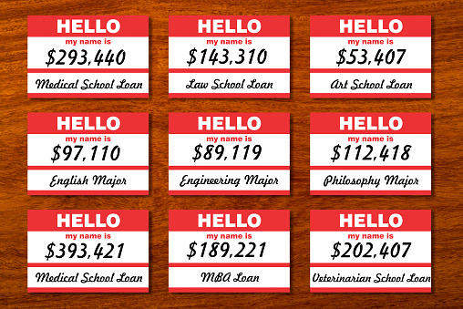 Student loan debt listed on table with name tags.