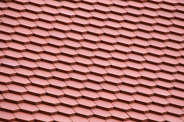 Cтоковое фото Красный плитки на крыше на фоне