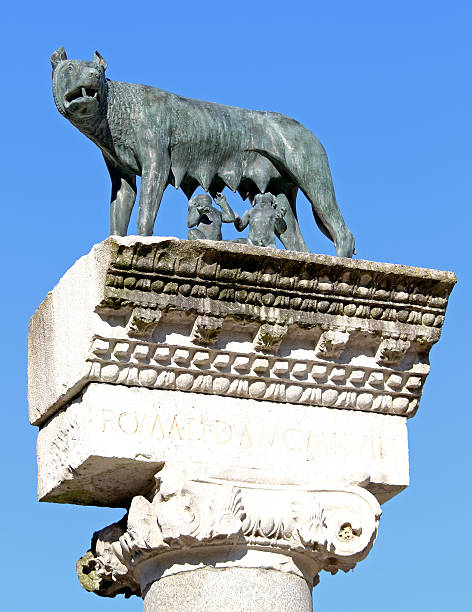 istock Ancient Capitoline Wolf above the Roman column while suckling Ro 499195277