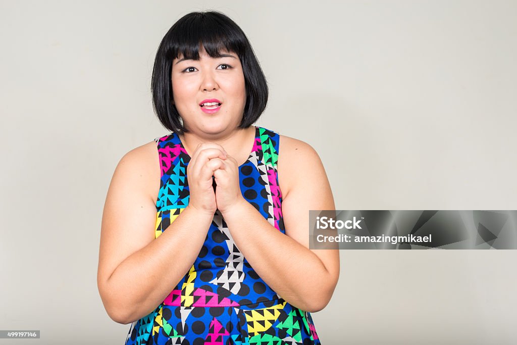 Portrait of beautiful overweight Asian woman Studio shot of beautiful overweight Asian woman 20-29 Years Stock Photo