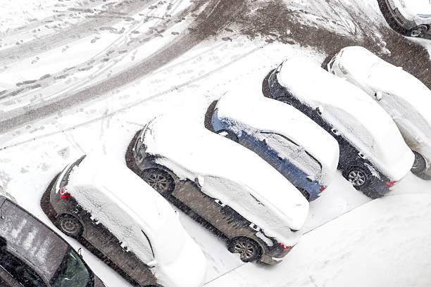 istock Cars Covered in Fresh Snow Fall 499198748
