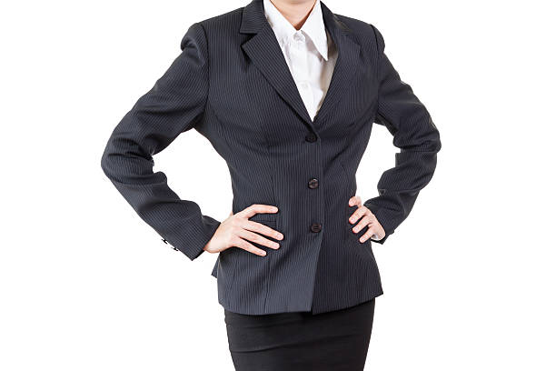 business woman with arms akimbo stock photo