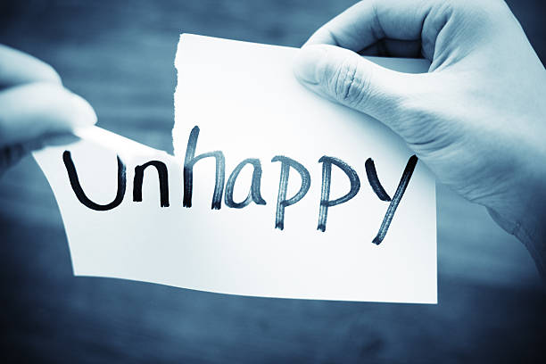 istock Hands Tearing Paper with the Words - Unhappy become Happy 499201974