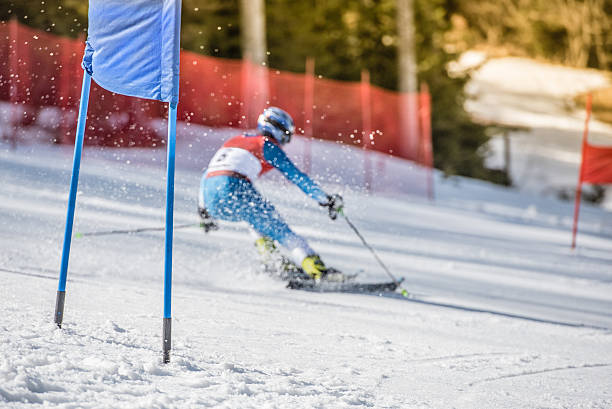 istock Rear View Of A Blurred Professional Alpine Skier 499202580