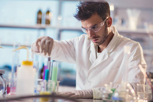 istock Male chemist working on chemical substances in a laboratory. 499204442