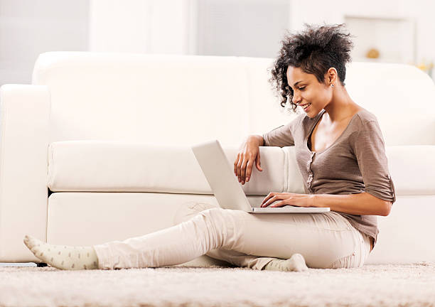 istock African American woman using laptop. 499205023