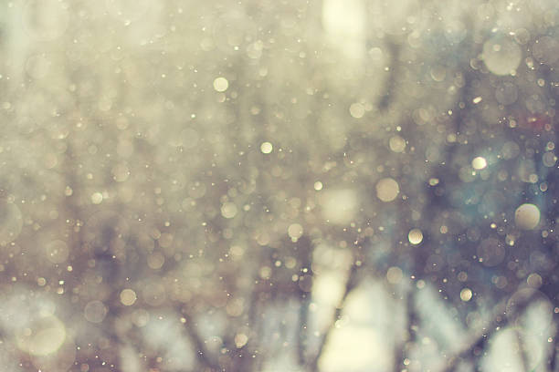 Blurred abstract background. Sunlight winter snowflake backgroun stock photo