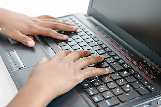 istock black woman hands on laptop keyboard 499205746