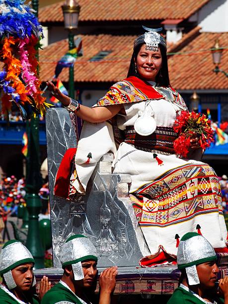 Queen of Inti raymi carried into plaza de armas, Cusco Cusco, Peru - June 24, 2014: Woman dressed as Inca Queen of Inti raymi carried into plaza de armas, by men dressed as her servants, Cusco, Peru inti raymi stock pictures, royalty-free photos & images