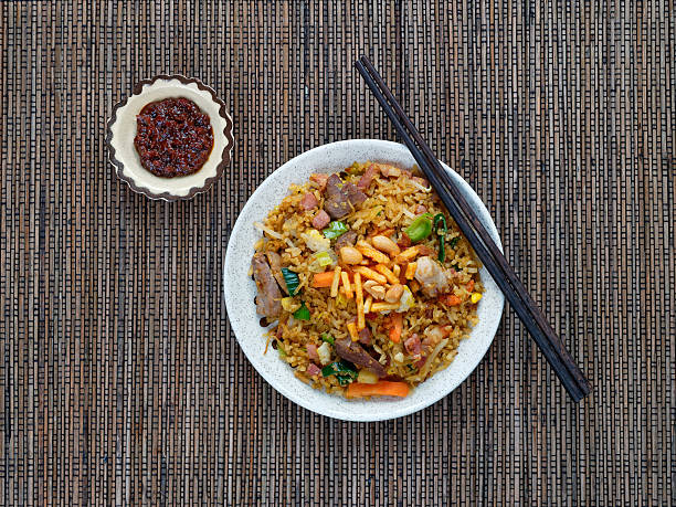 istock Nasi goreng with sambal, Indonesian fried rice with chili paste 499207993