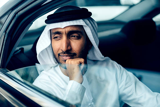 istock Emirati Businessman in a car, Dubai 499208196