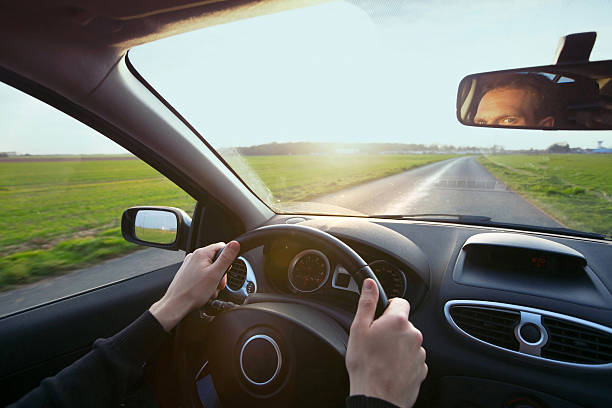 driving car, hands on the steering wheel
