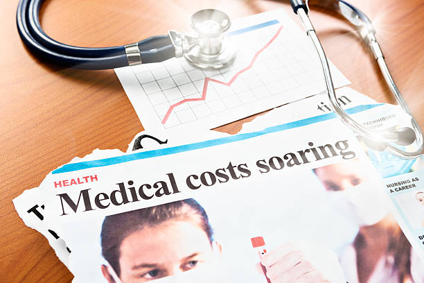 istock 'Medical costs soaring' article with rising graph and stethoscope 499210816