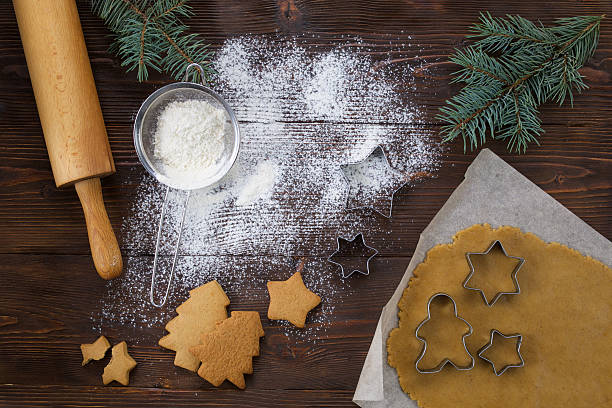 istock Gingerbread dough and cookies on parchment 499210826