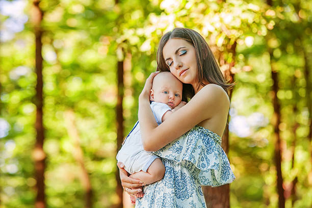 istock Mother with her child take rest in park 499224946