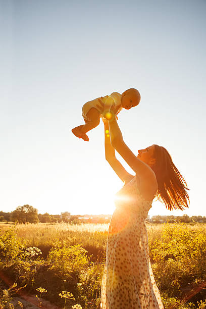 istock Mother with her child take rest in park 499225198