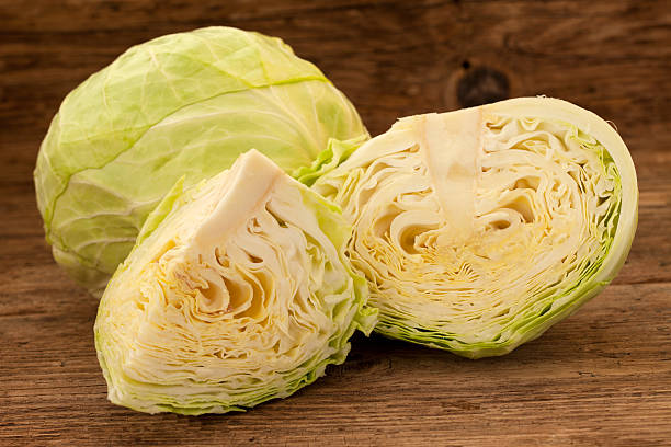 istock Head of cabbage and cut cabage 499225858
