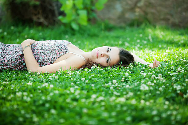 istock Young beautiful caucasian woman takes rest in park 499226708