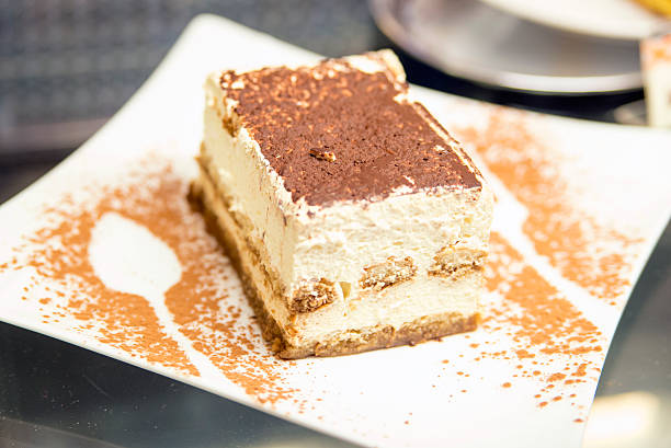 Creamy Italian tiramisu with a coffee flavored custard and ladyfingers layered with whipped eggs and mascarpone cheese infused with cocoa.