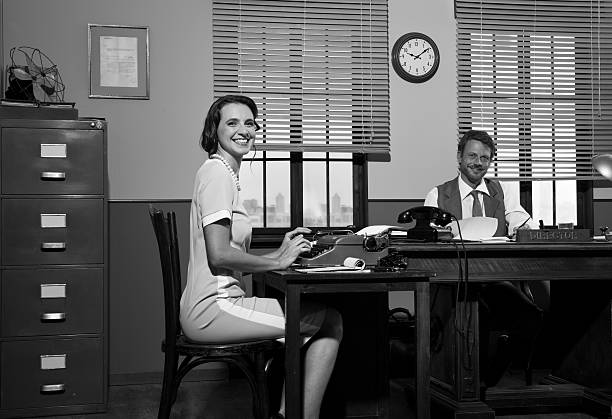 istock Smiling director and secretary at work 499227920