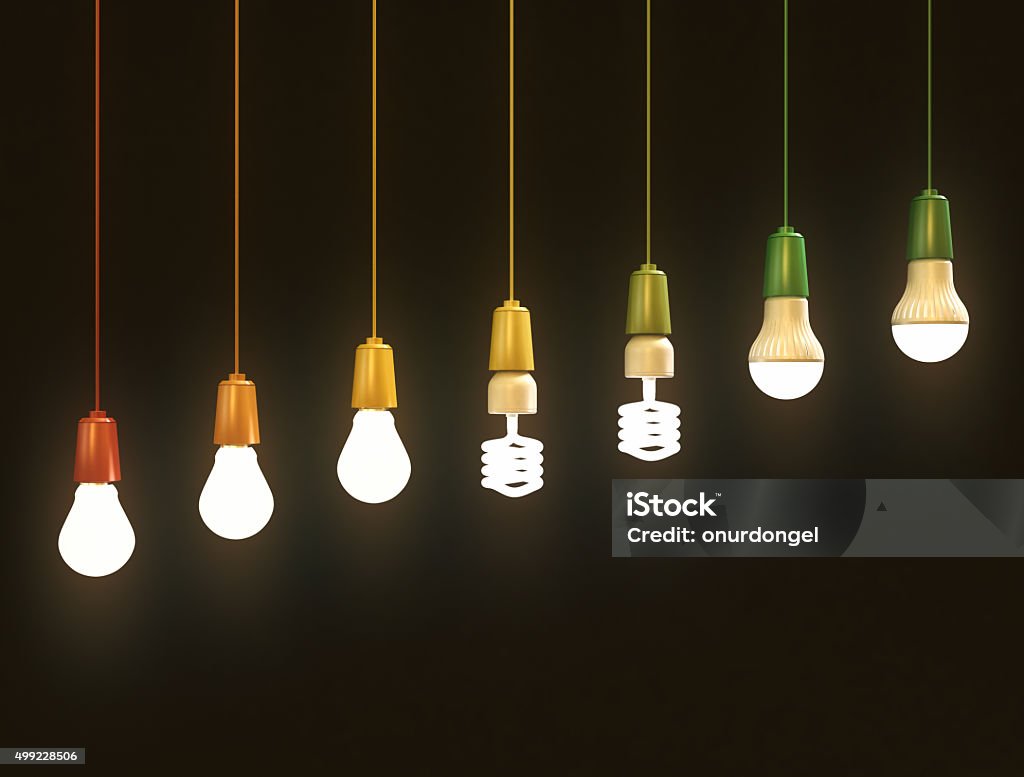 Économies d'énergie et les ampoules sur fond noir - Photo de Ampoule électrique libre de droits