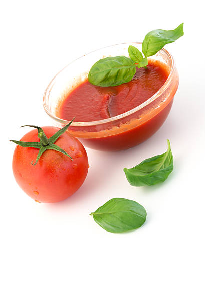 istock Tomato sauce and basil leaves on white background 499229159