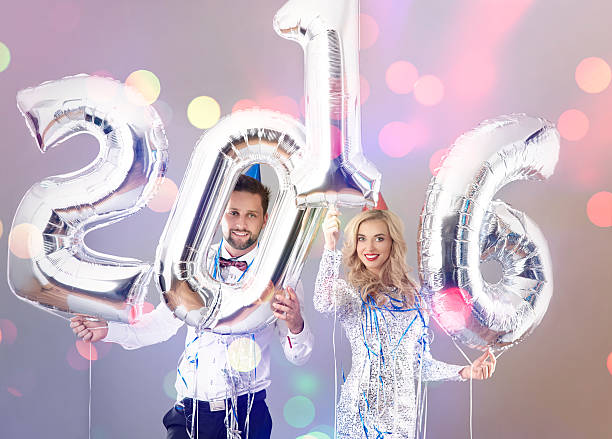 istock Elegant couple celebrating the New Year 499230498