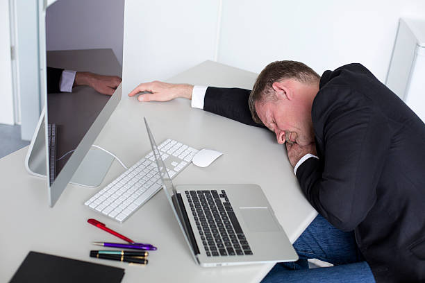 istock man at the office relaxing 499230713